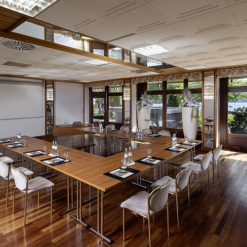 U-shaped conference room with daylight and view of Lake Titisee
