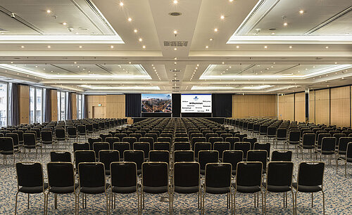 Large conference hall at Maritim proArte Hotel Berlin with seating for a large event or conference.