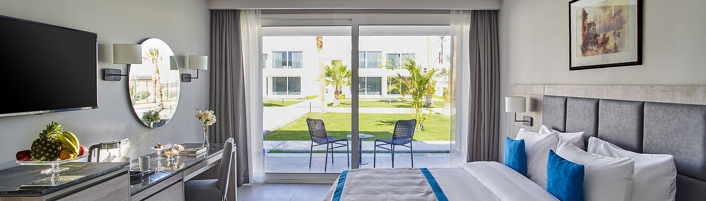 Modern double room at Maritim Jolie Ville Resort & Casino Sharm El Sheikh with terrace and garden views