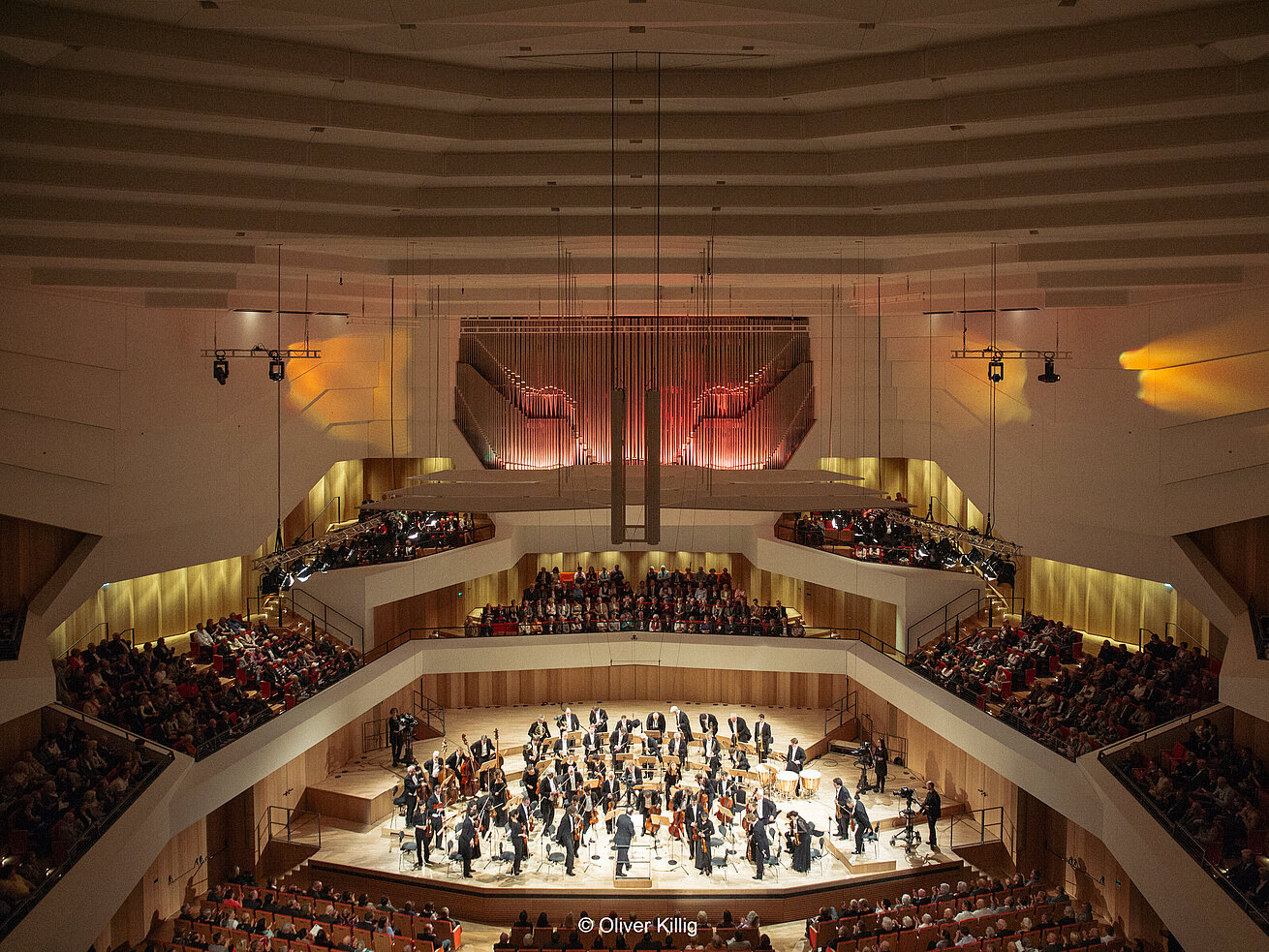 Concert at Kulturpalast Dresden with orchestra, modern architecture and audience in concert hall