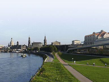 View of Dresden's historic old town with the Elbe River and famous landmarks in sunlight
