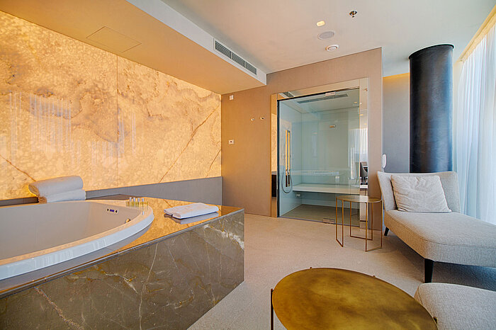 Elegant spa suite with whirlpool and loungers at the Maritim Hotel Plaza Tirana