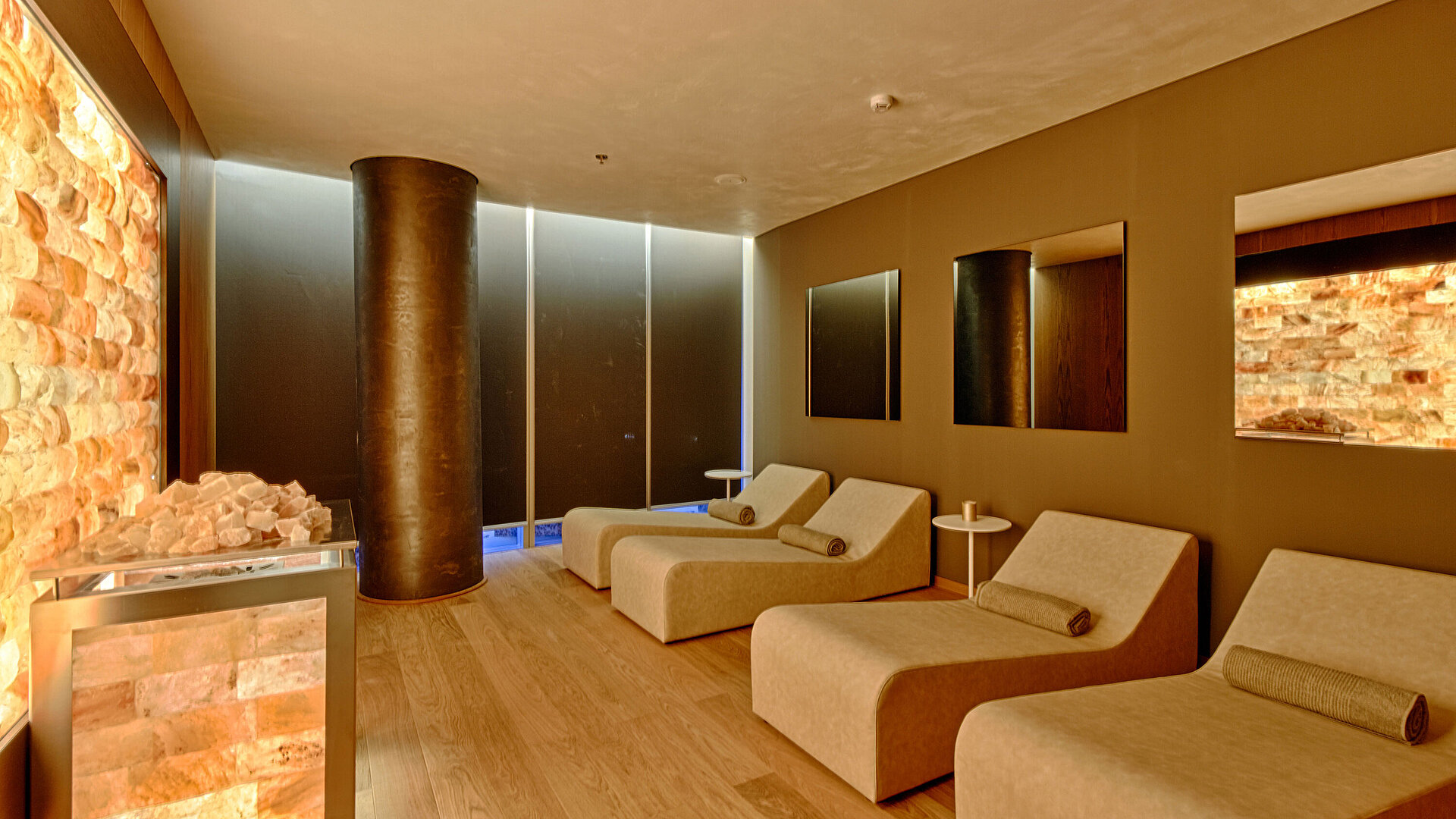 Relaxation room with heated loungers and salt wall at Oblivion Spa, Maritim Hotel Plaza Tirana