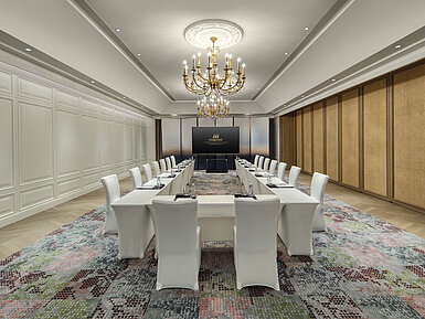 Elegant meeting room with U-shaped seating and chandelier at Maritim Hotel for professional events