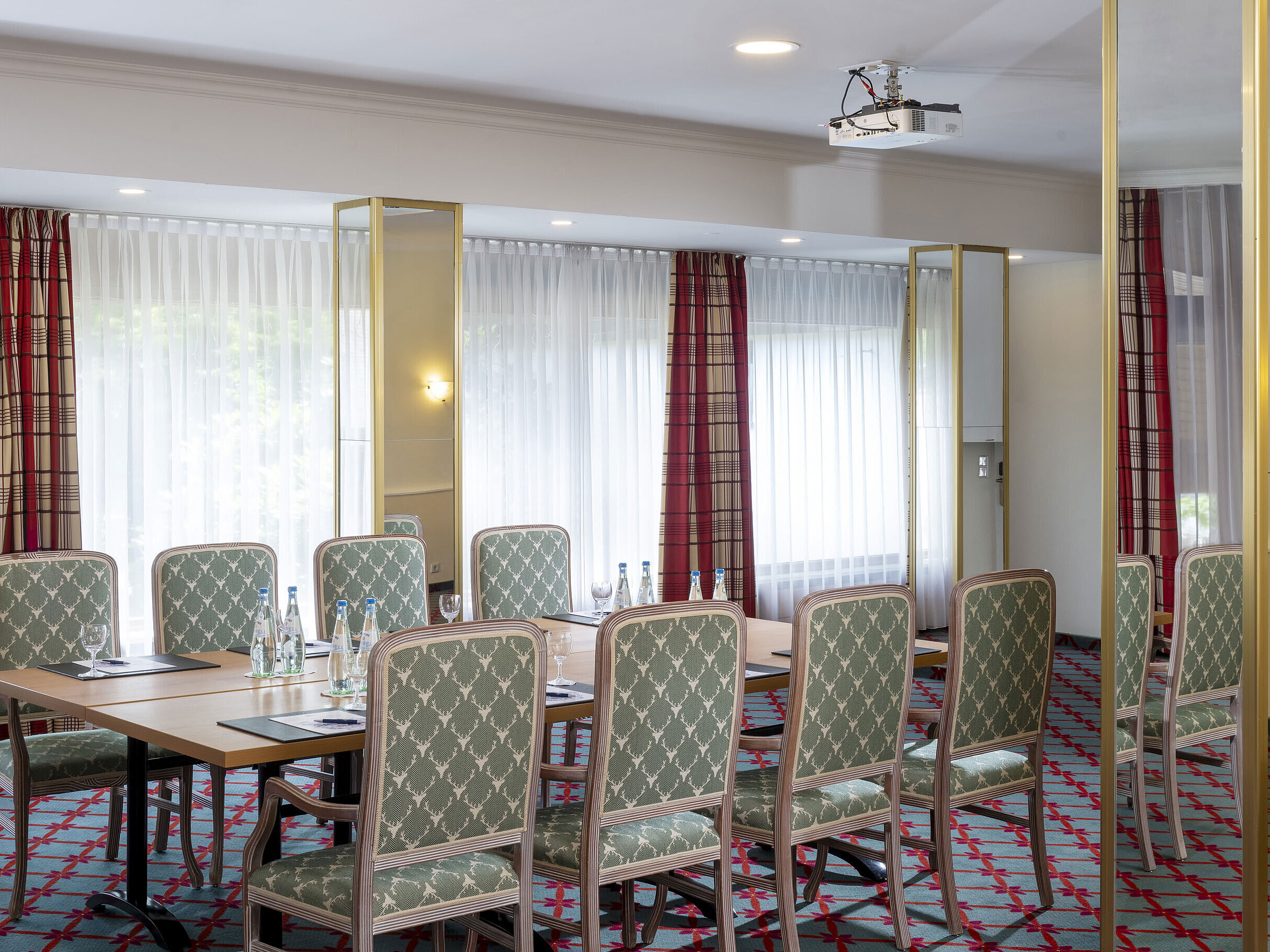 Small conference room with elegant seating at Maritim Hotel Titisee