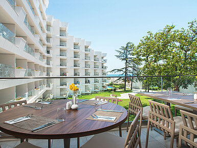 Restaurant terrace at Maritim Hotel Amelia overlooking the garden, hotel and sea