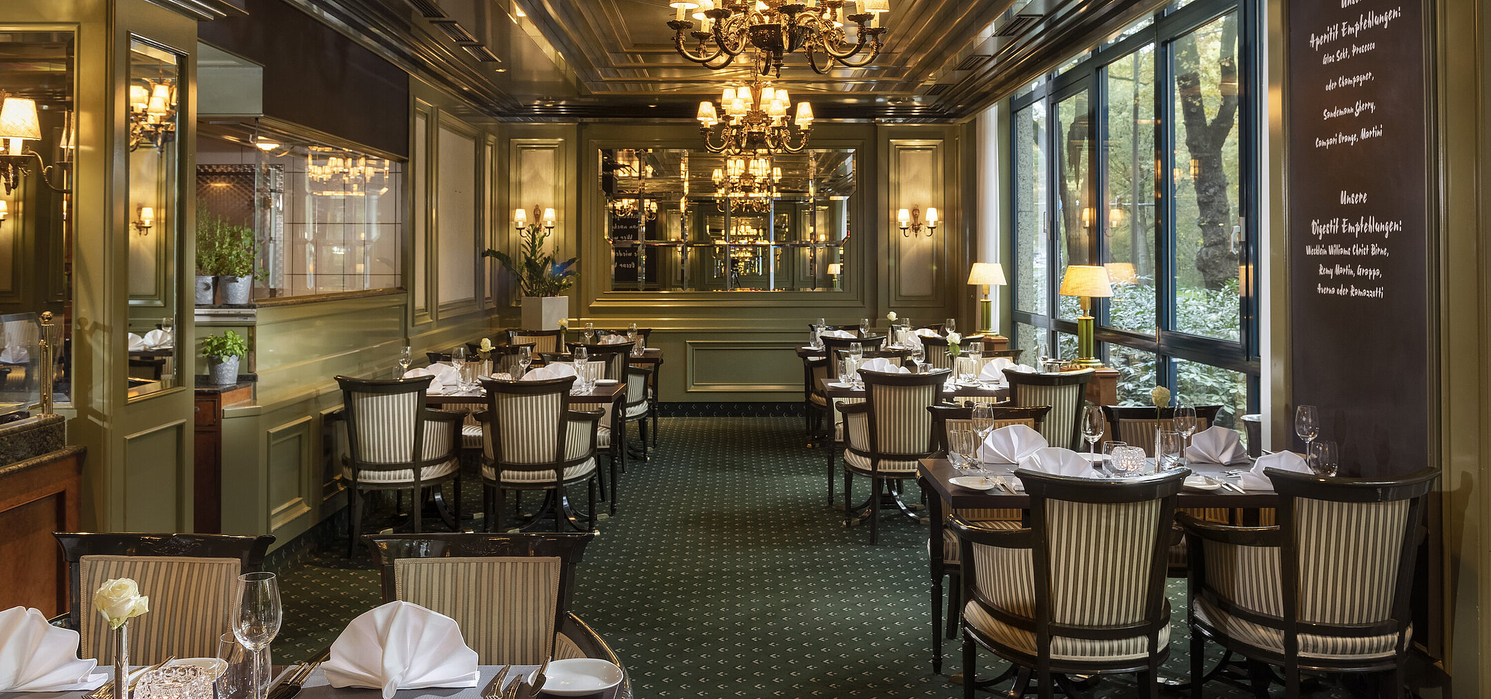 Elegant L'Echalote restaurant in the Maritim Hotel Bremen, stylish decor and set tables for a refined dining experience.