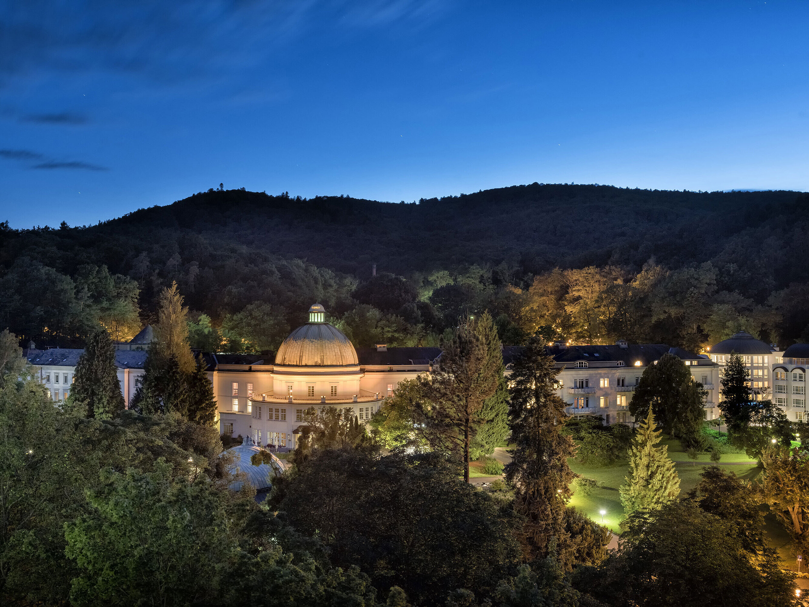 Maritim Hotel Bad Wildungen at night, beautifully lit and surrounded by nature