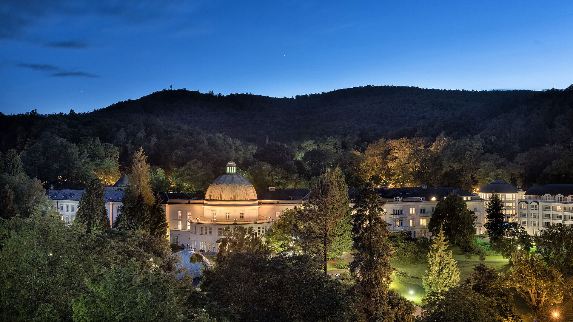 Maritim Hotel Bad Wildungen at night, beautifully lit and surrounded by nature