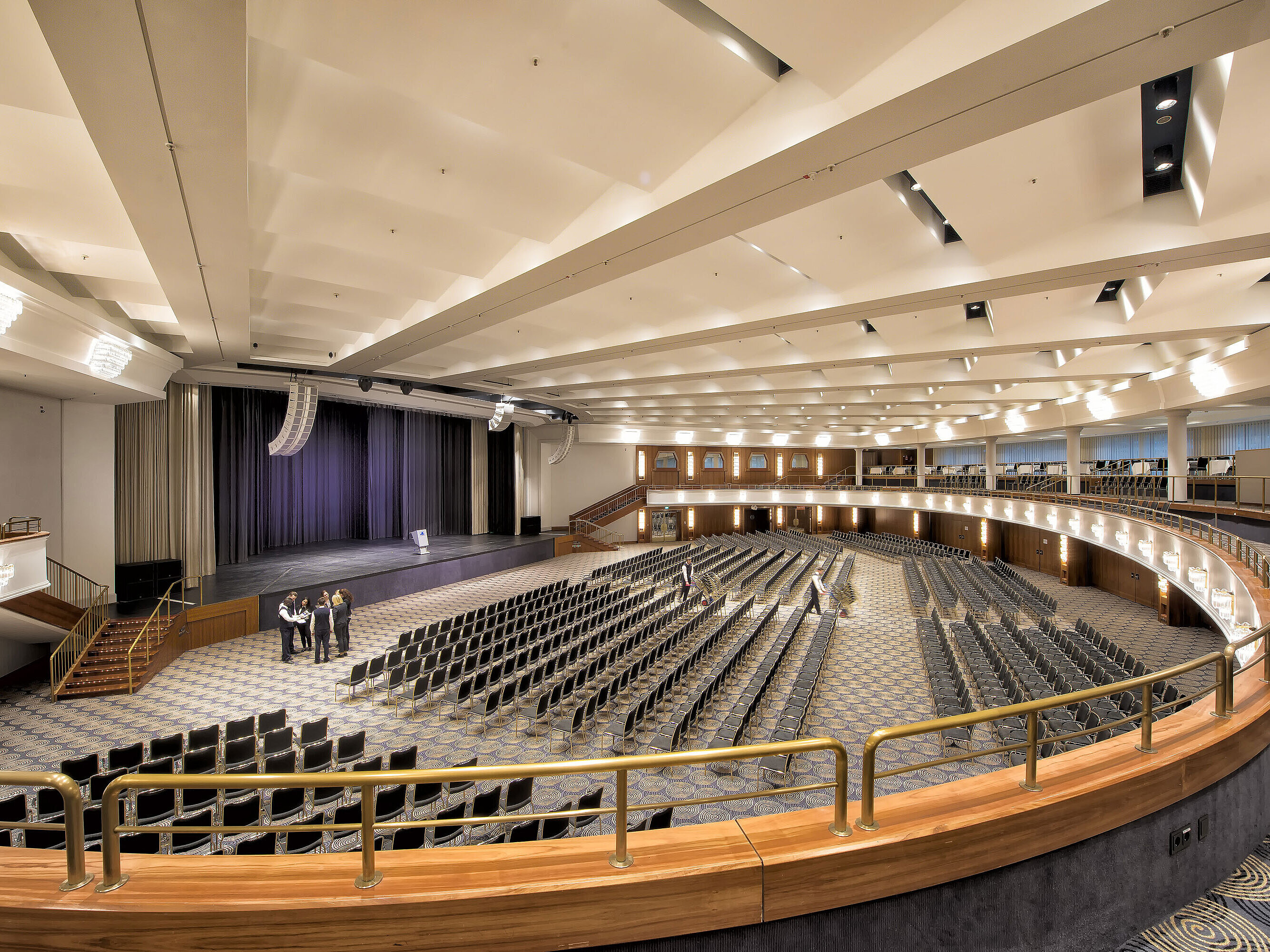 Maritim Hall at Maritim Hotel Bonn, with row seating and a stage, perfect for conferences and large events.