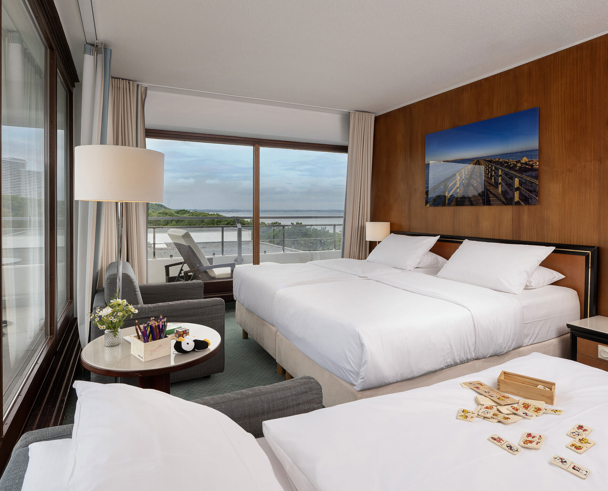 Bright family room at Maritim Seehotel Timmendorfer Strand with balcony and Baltic Sea view