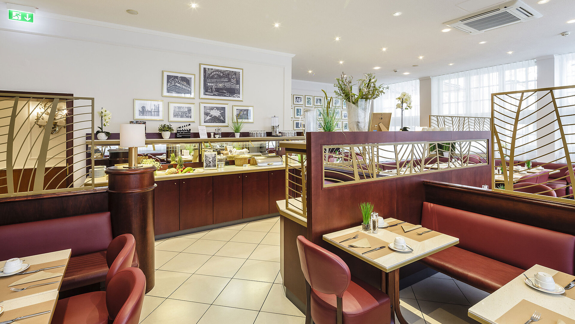 Stylish breakfast restaurant with buffet, set tables and comfortable seating areas