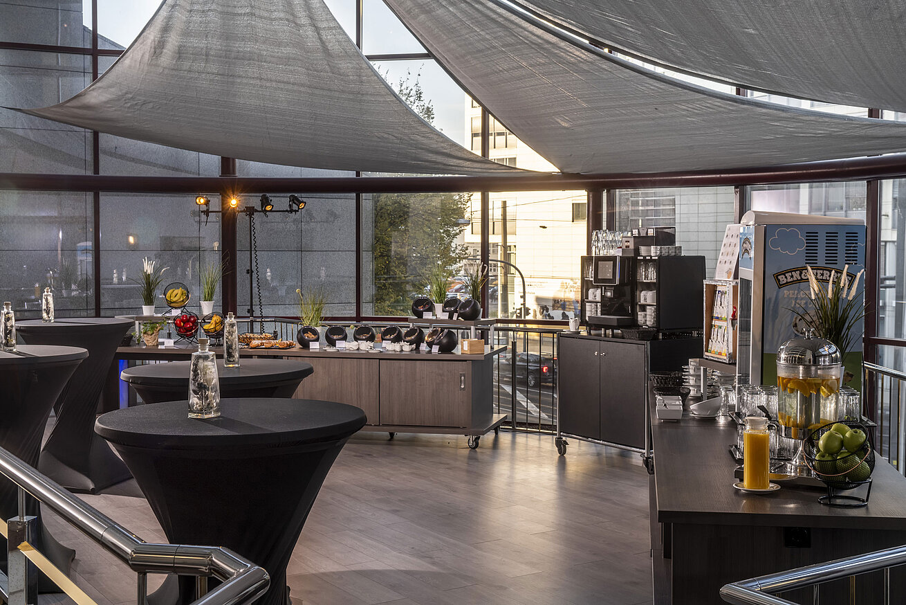 Modern coffee break area with snacks and drinks at Maritim Hotel Magdeburg