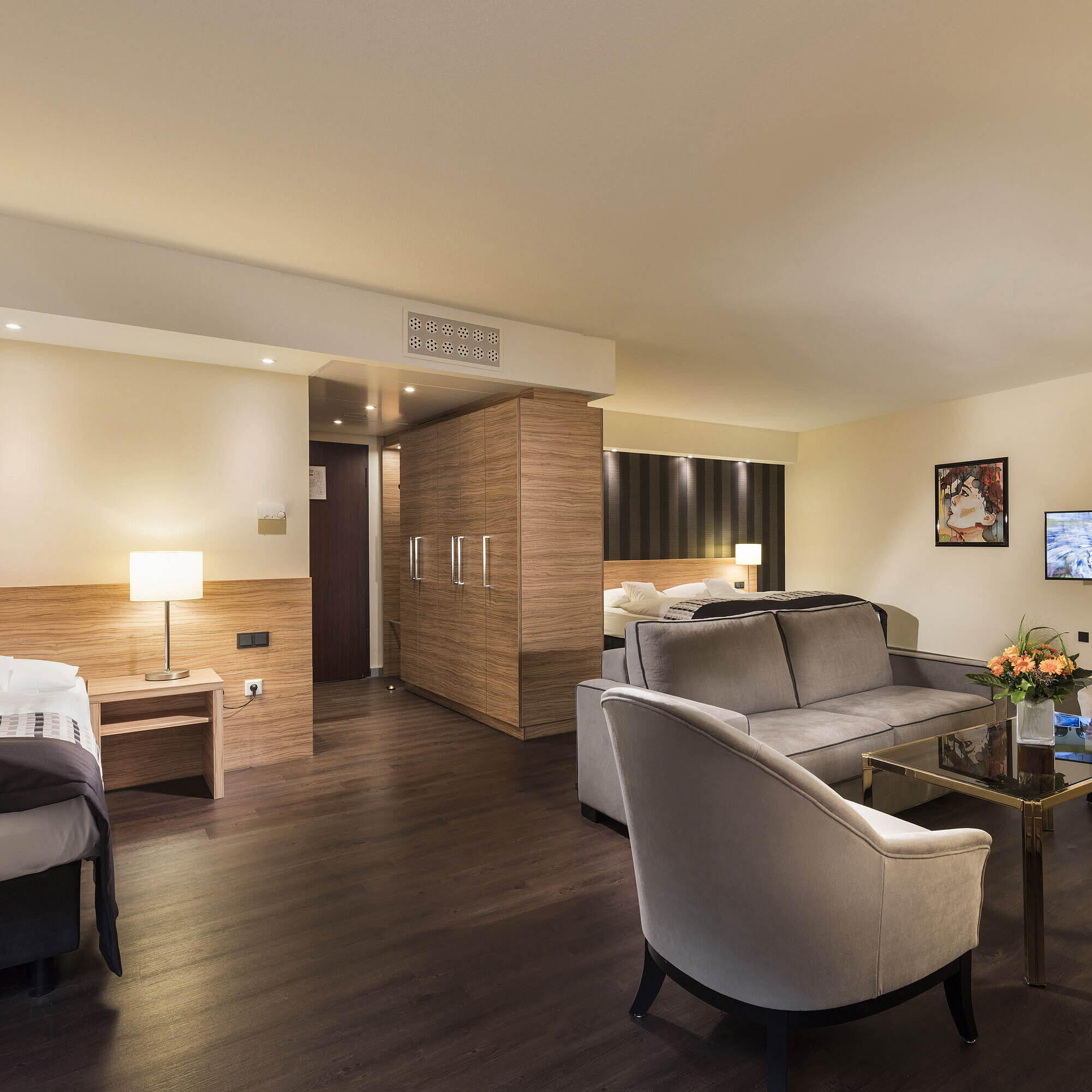 Elegant suite at Maritim Hotel Königswinter with modern living area and luxurious furnishings.