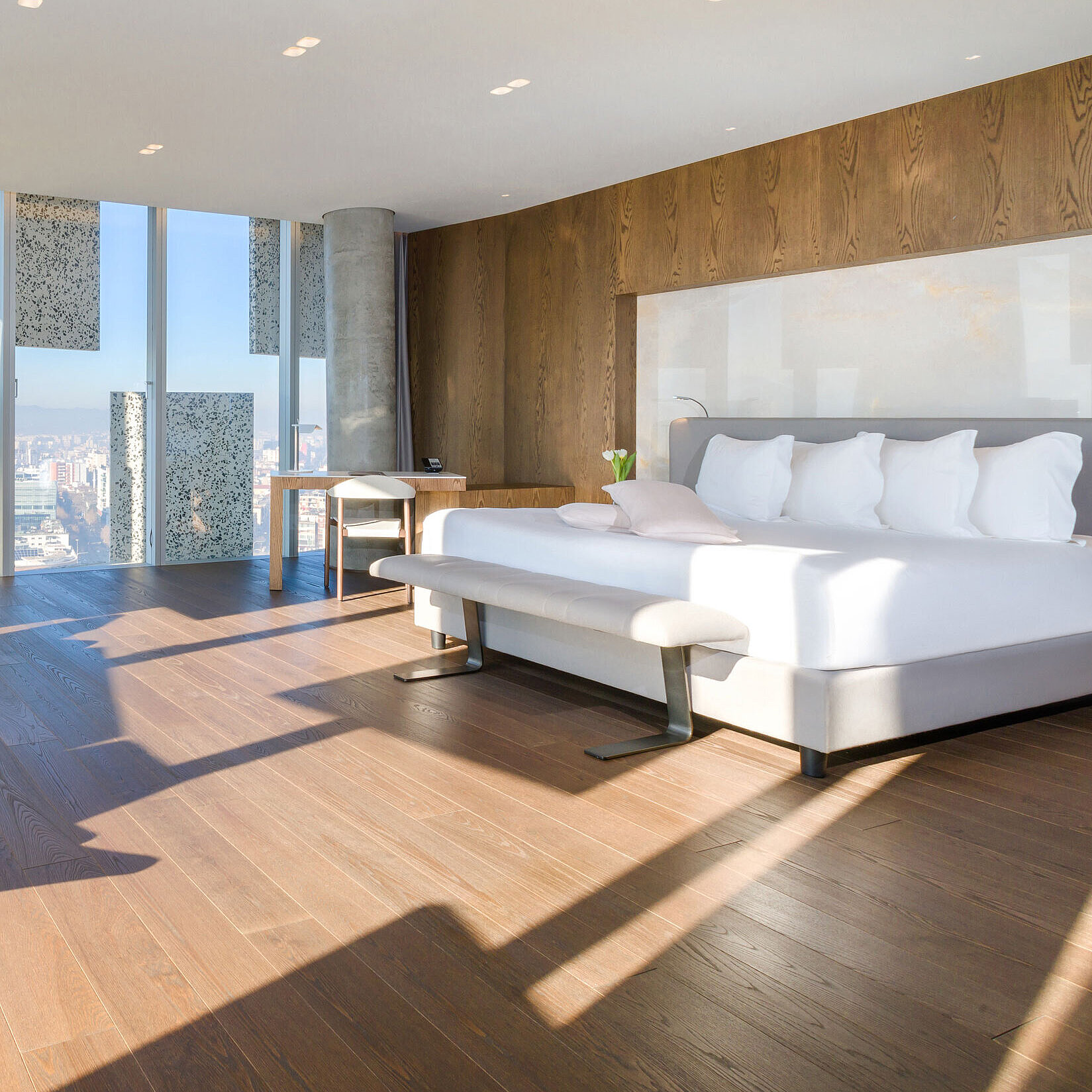 Bright panorama suite with city view and designer furniture at Maritim Hotel Plaza Tirana