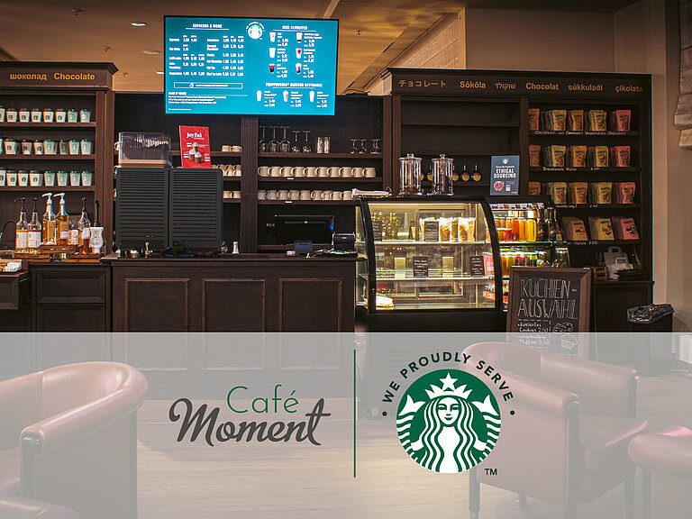 Café at the Maritim Hotel Bonn with Starbucks coffee, snack counter, cake display and cosy seating in a modern setting