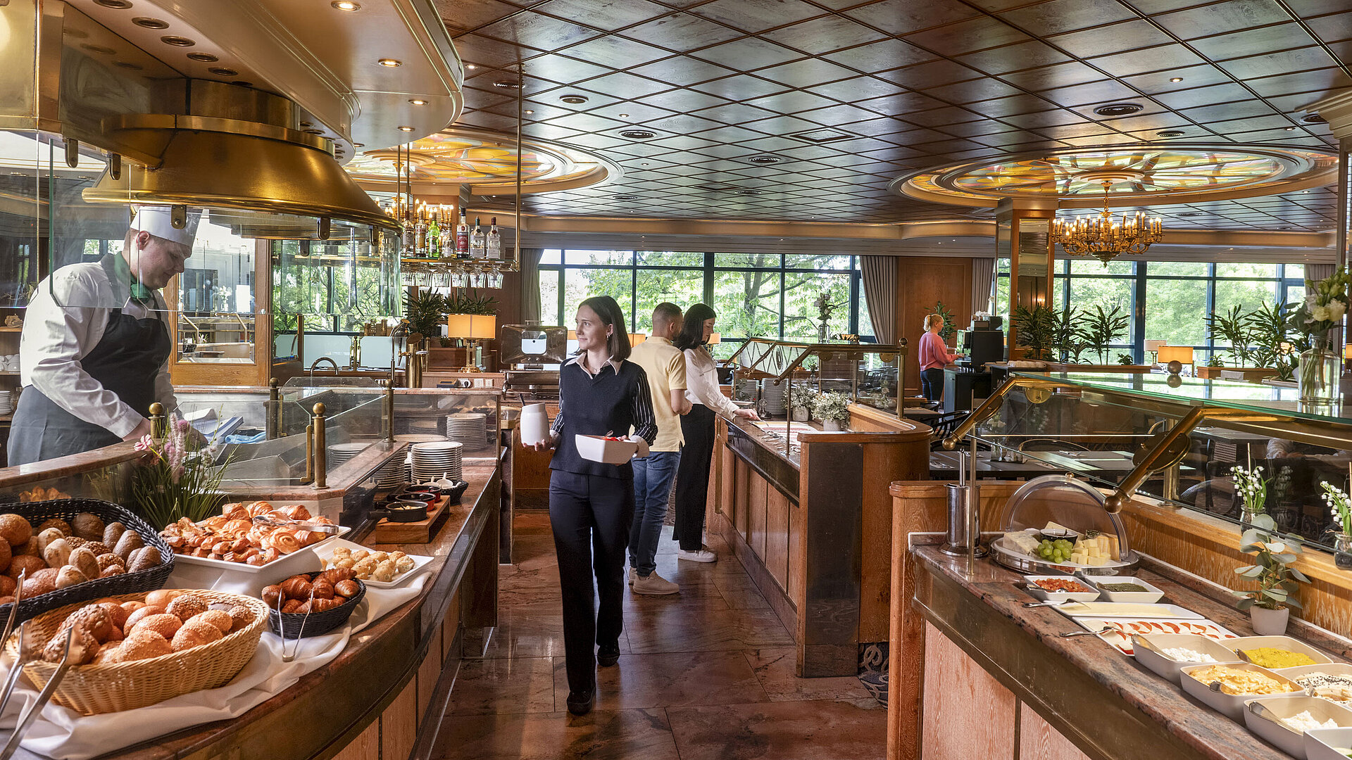 Rich breakfast buffet at Maritim Hotel Hannover with fresh pastries and hot dishes.