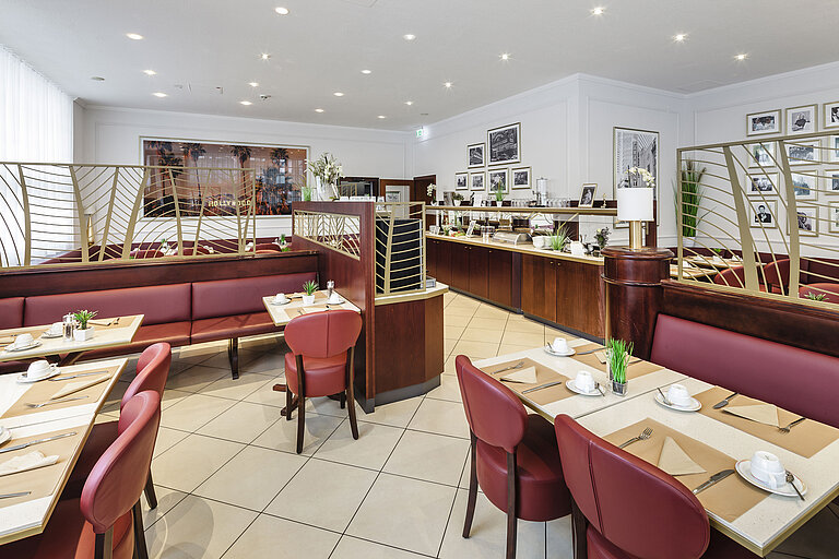 Stylish breakfast restaurant with buffet, set tables and comfortable seating areas