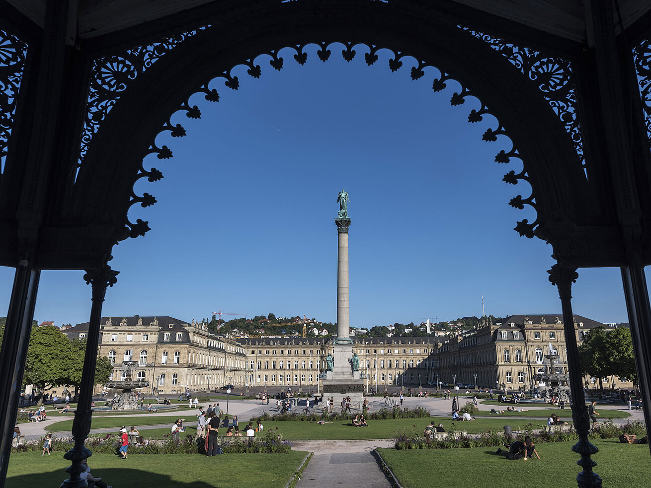 Jubilee Column at Schlossplatz in Stuttgart, framed by the historic music pavilion