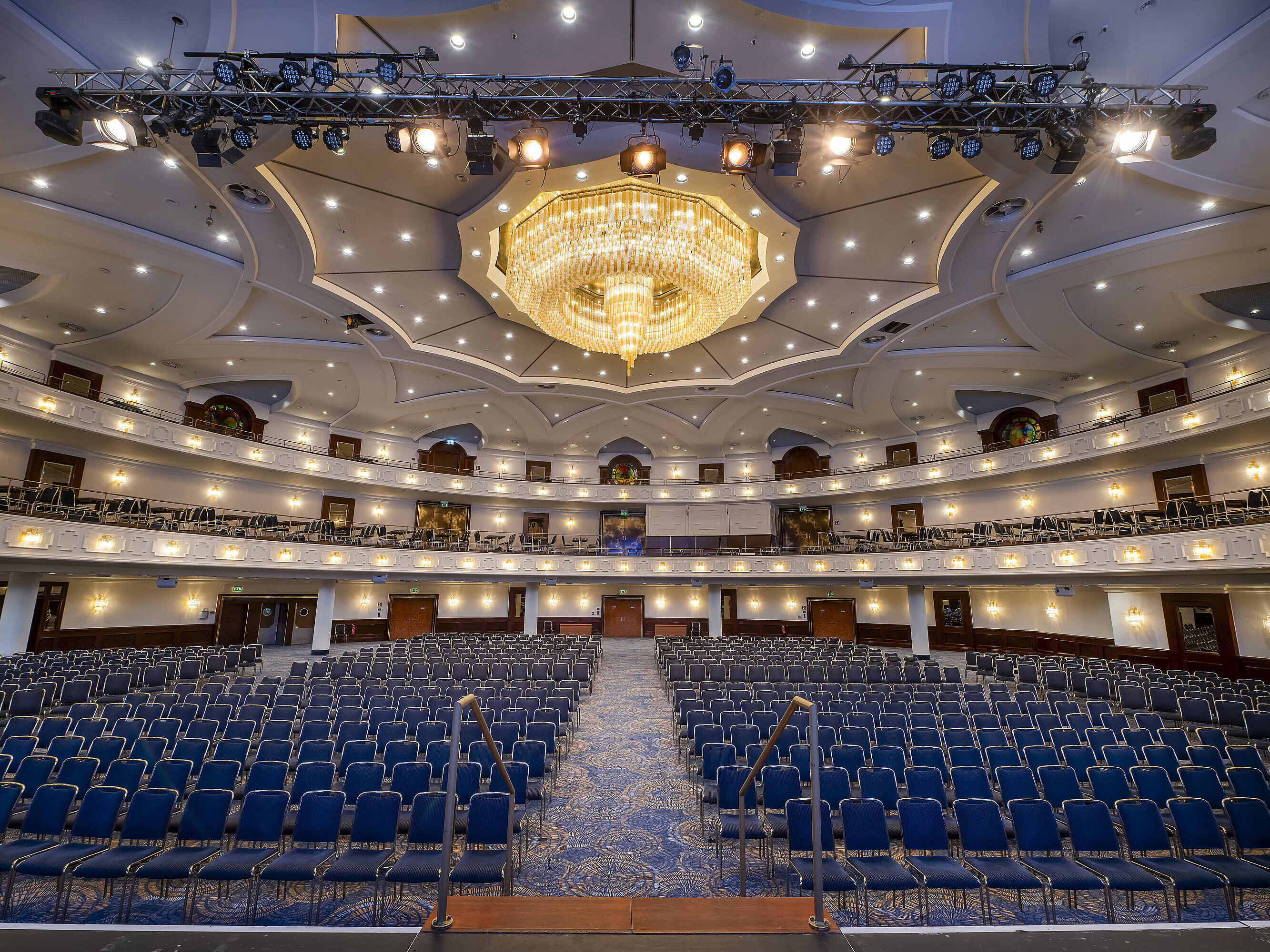 Spacious Maritim Hall at Maritim Hotel Cologne, ideal for large events and conferences, with luxurious lighting and seating.