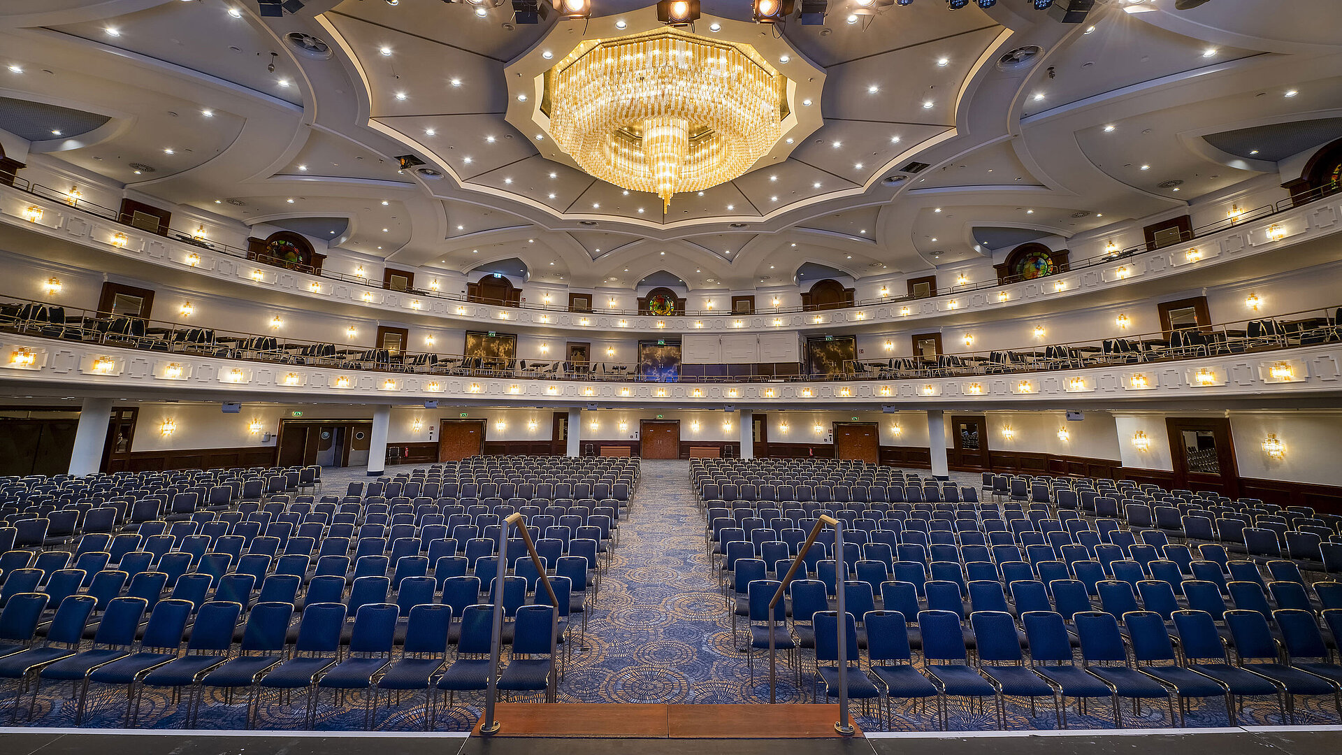 Spacious Maritim Hall at Maritim Hotel Cologne, ideal for large events and conferences, with luxurious lighting and seating.
