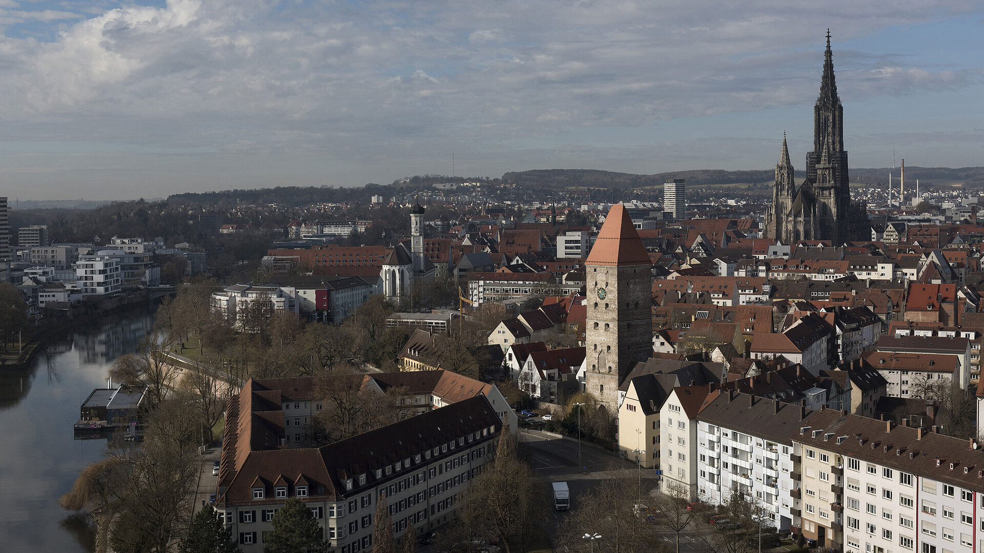 City view of Ulm with Danube, city tower and Ulm Minster in daylight.