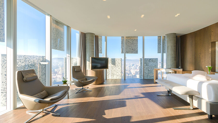 Bright panorama suite with city view and designer furniture at Maritim Hotel Plaza Tirana
