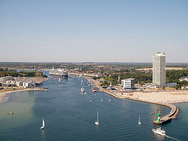 Aerial view of Travemünde with cruise ship, promenade and Maritim Hotel by the Baltic Sea