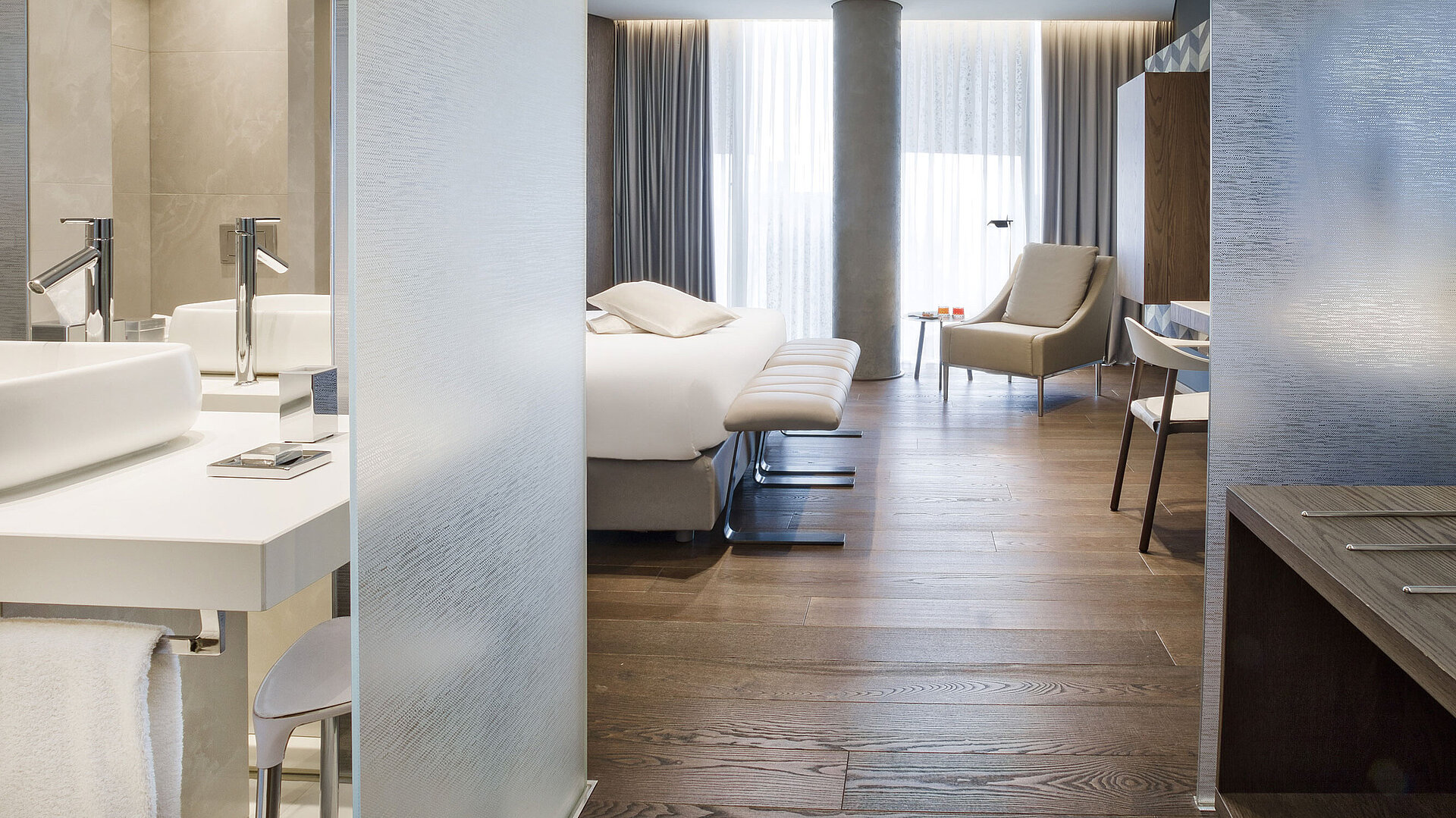 Bright modern room at Maritim Hotel Plaza Tirana with elegant design and wooden floor