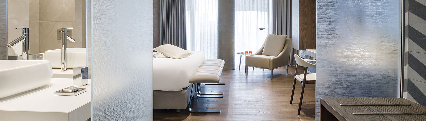 Bright modern room at Maritim Hotel Plaza Tirana with elegant design and wooden floor