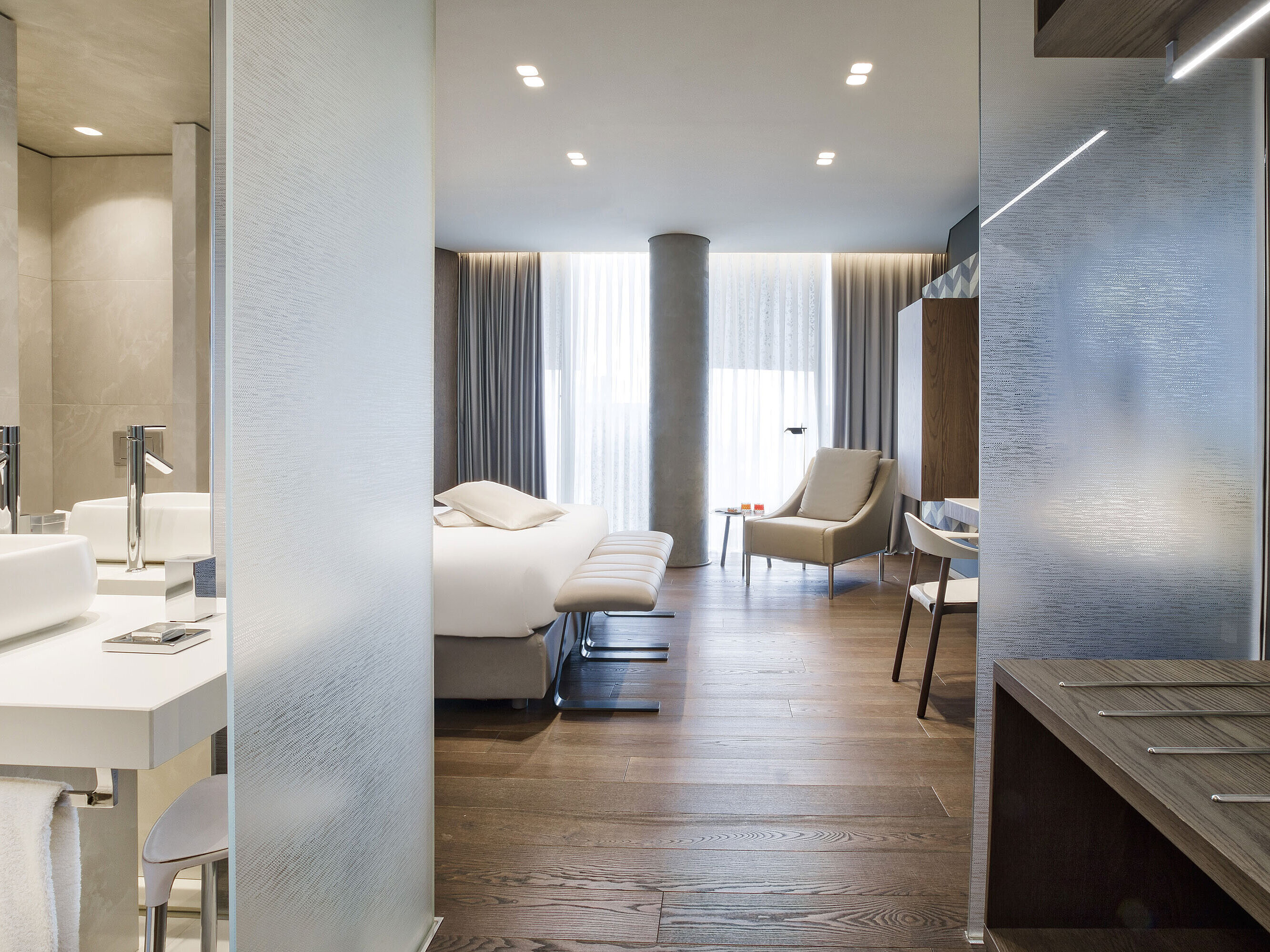 Bright modern room at Maritim Hotel Plaza Tirana with elegant design and wooden floor