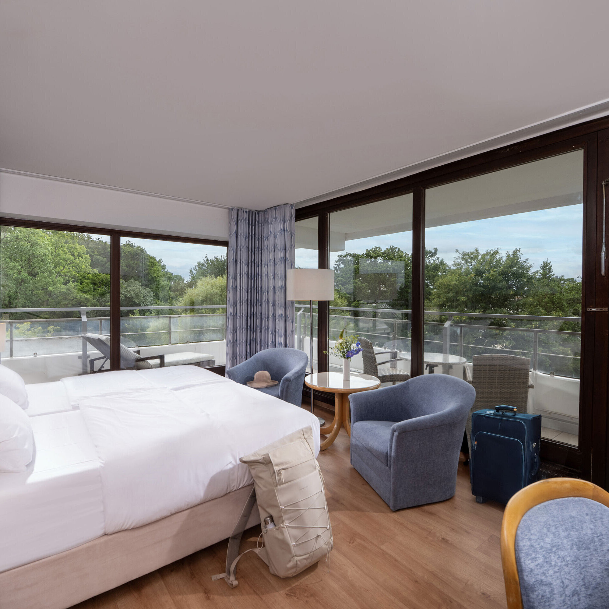 Modern double room at Maritim Seehotel Timmendorfer Strand with balcony and garden view