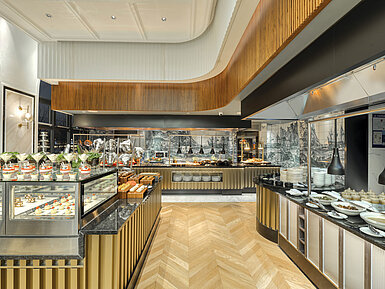 Modern buffet area featuring desserts, salads and hot dishes at Maritim Hotel Taicang