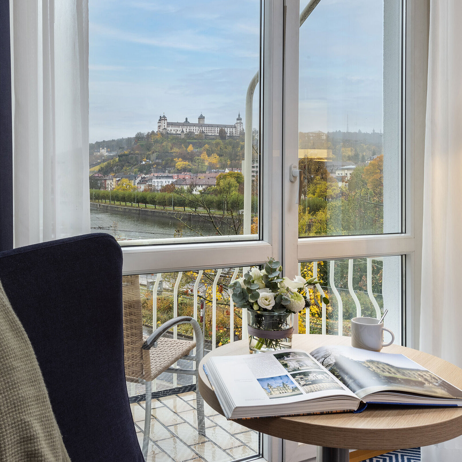 Comfortable Superior Room at Maritim Hotel Würzburg with a panoramic view of Marienberg Fortress
