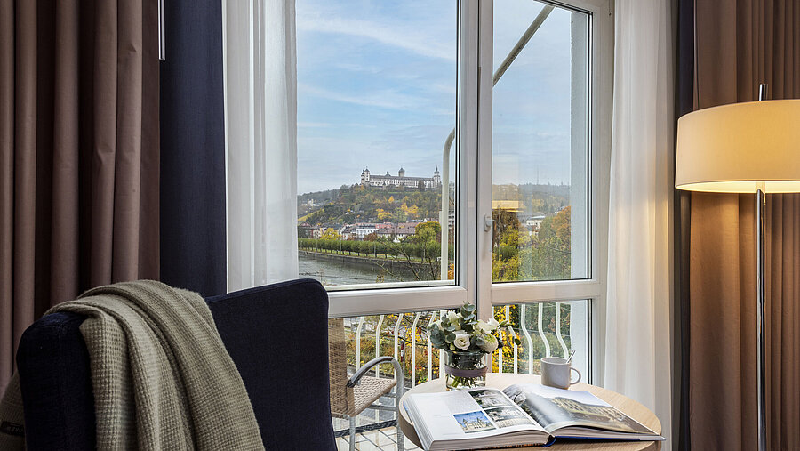 Comfortable Superior Room at Maritim Hotel Würzburg with a panoramic view of Marienberg Fortress