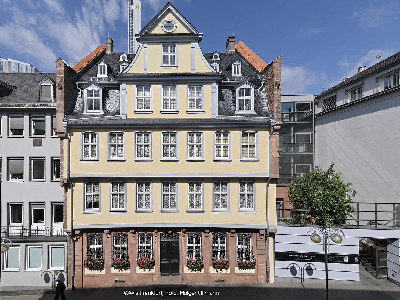 Historic building in central Frankfurt with traditional architecture and skyline in background