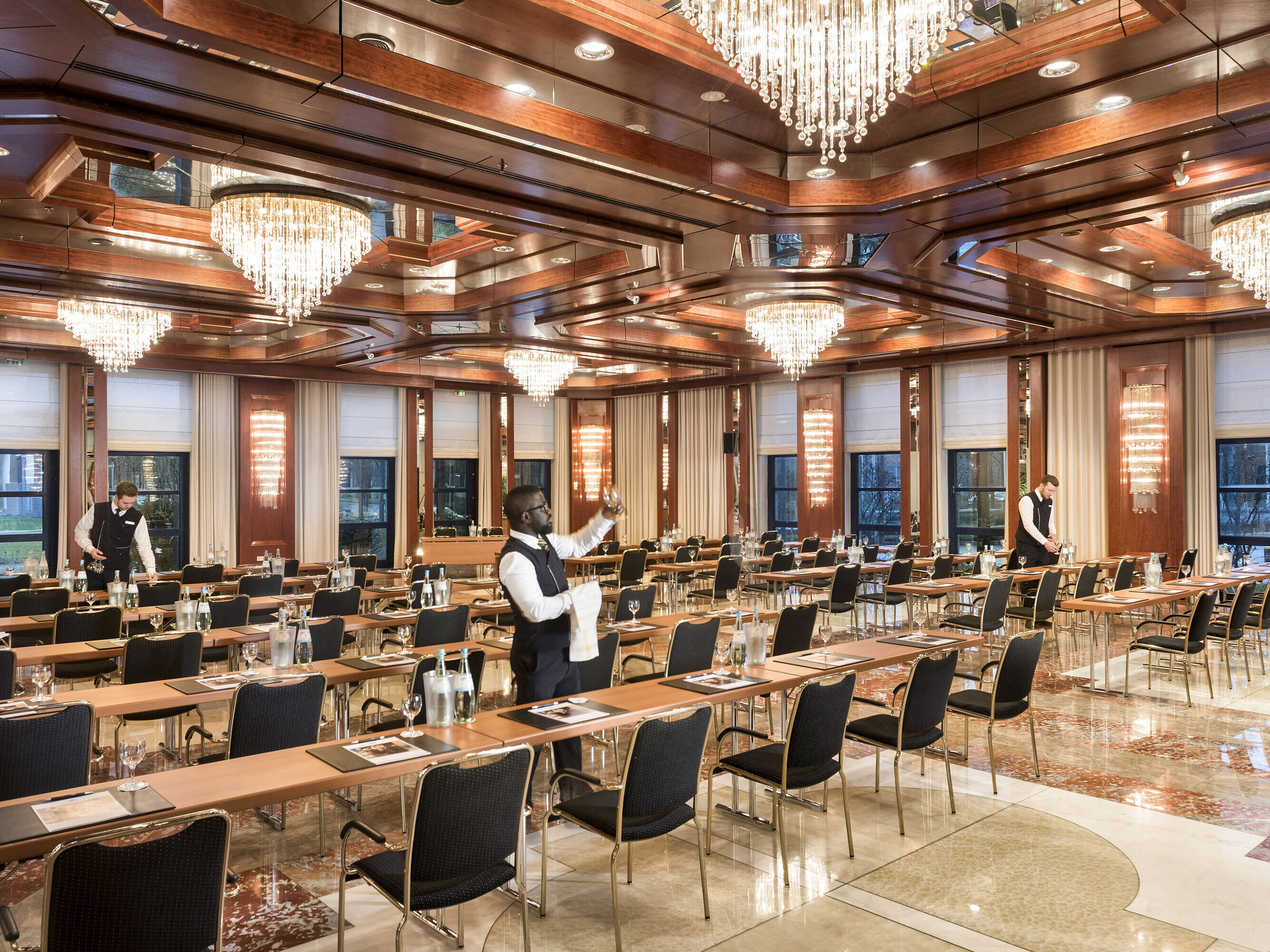 Reger Hall at Maritim Hotel Bonn, with elegant lighting and row seating, perfect for events and conferences.