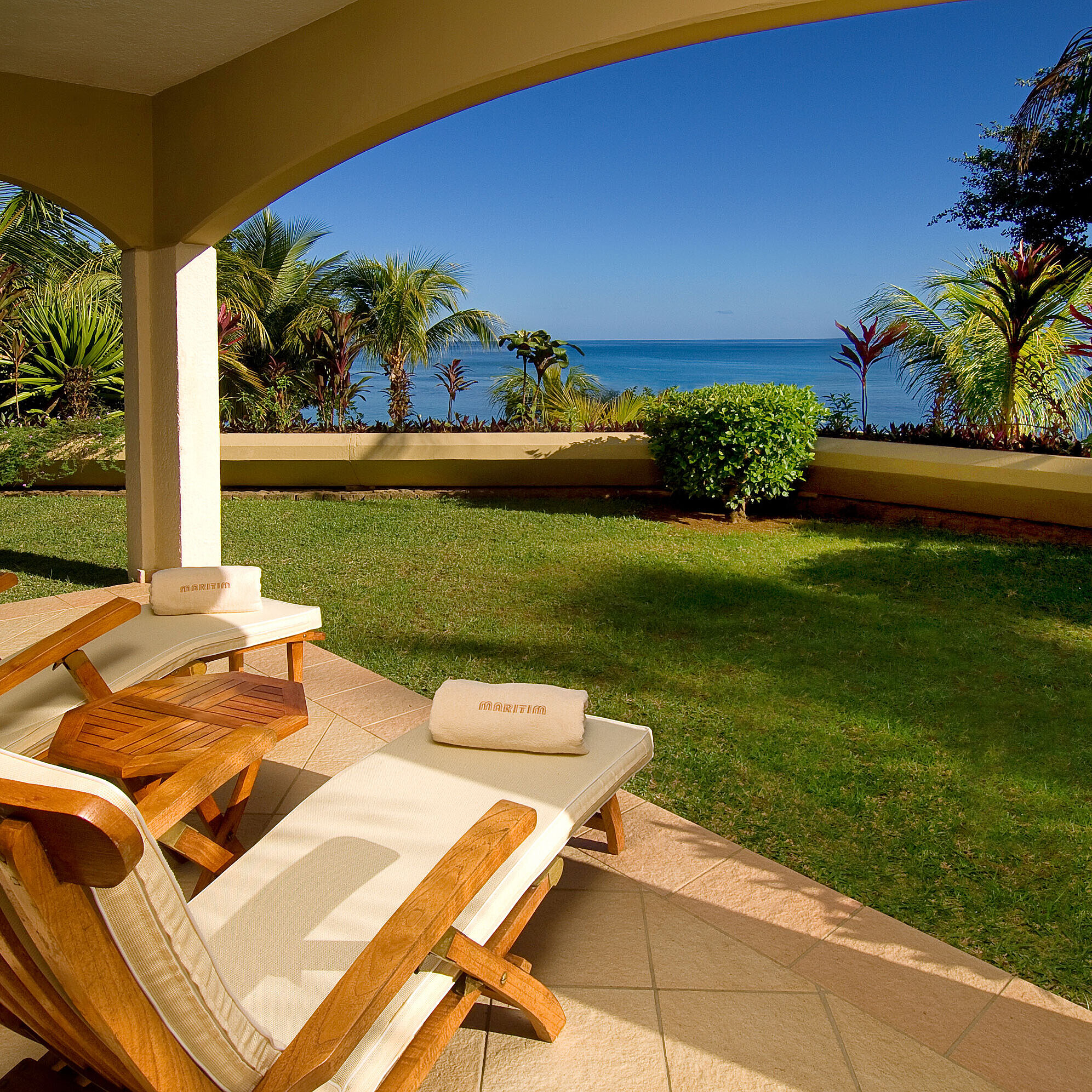 Terrace with sun loungers overlooking the Indian Ocean at Maritim Hotel Mauritius