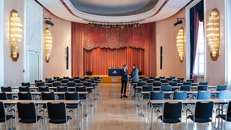 Waldeck Hall at Maritim Hotel Bad Wildungen with stage, row seating and bright, elegant atmosphere.