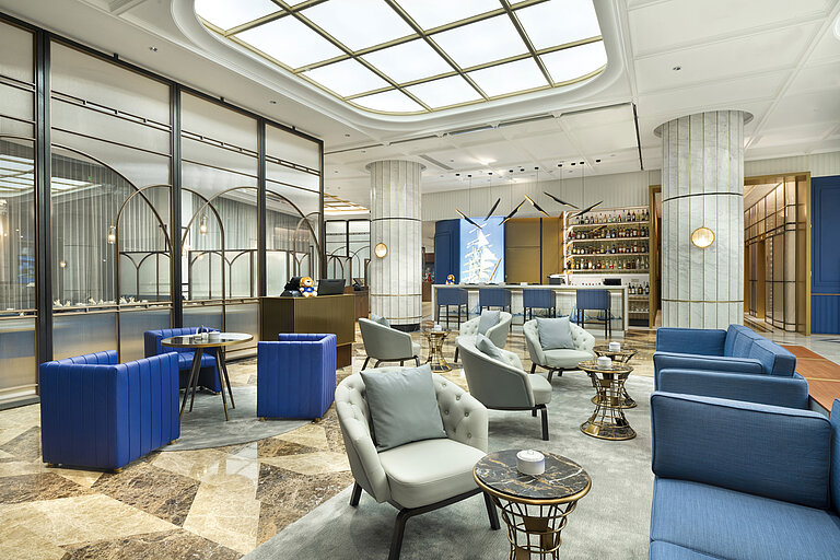 Modern lounge area with comfortable seating and stylish bar at Maritim Hotel Taicang