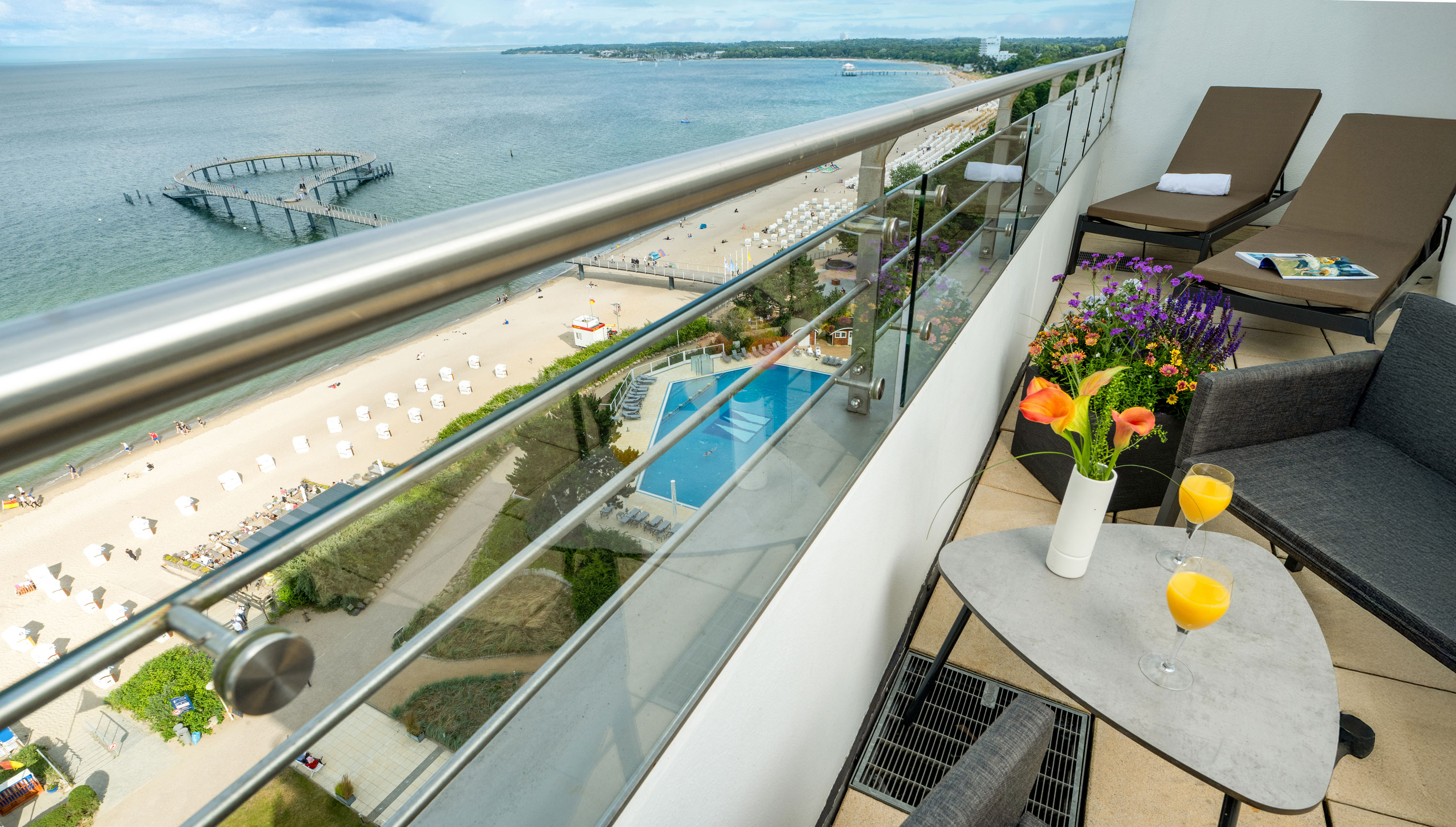 Balcony at Maritim Seehotel Timmendorfer Strand with view of beach, pier and Baltic Sea
